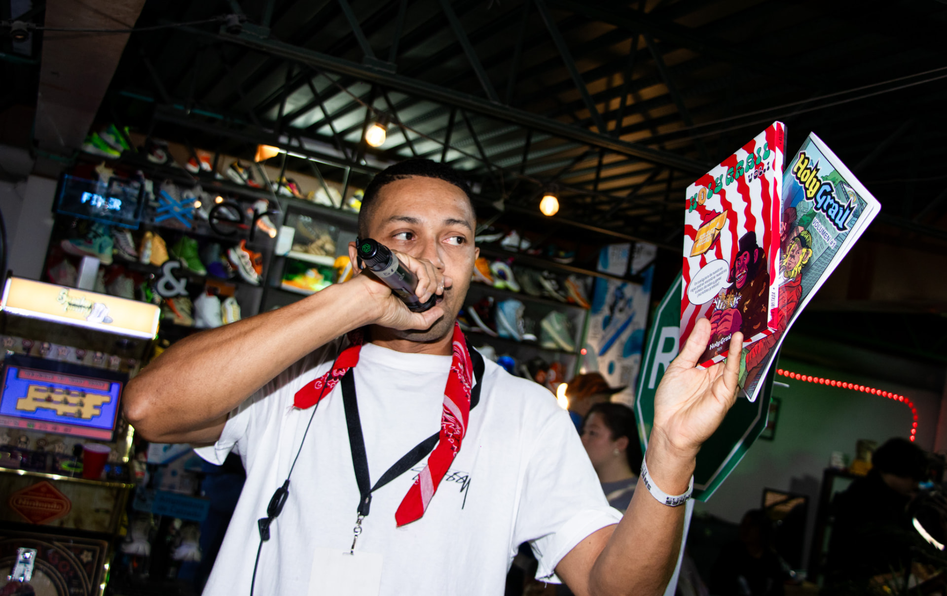 Presenting the Holy Grail comic on the microphone