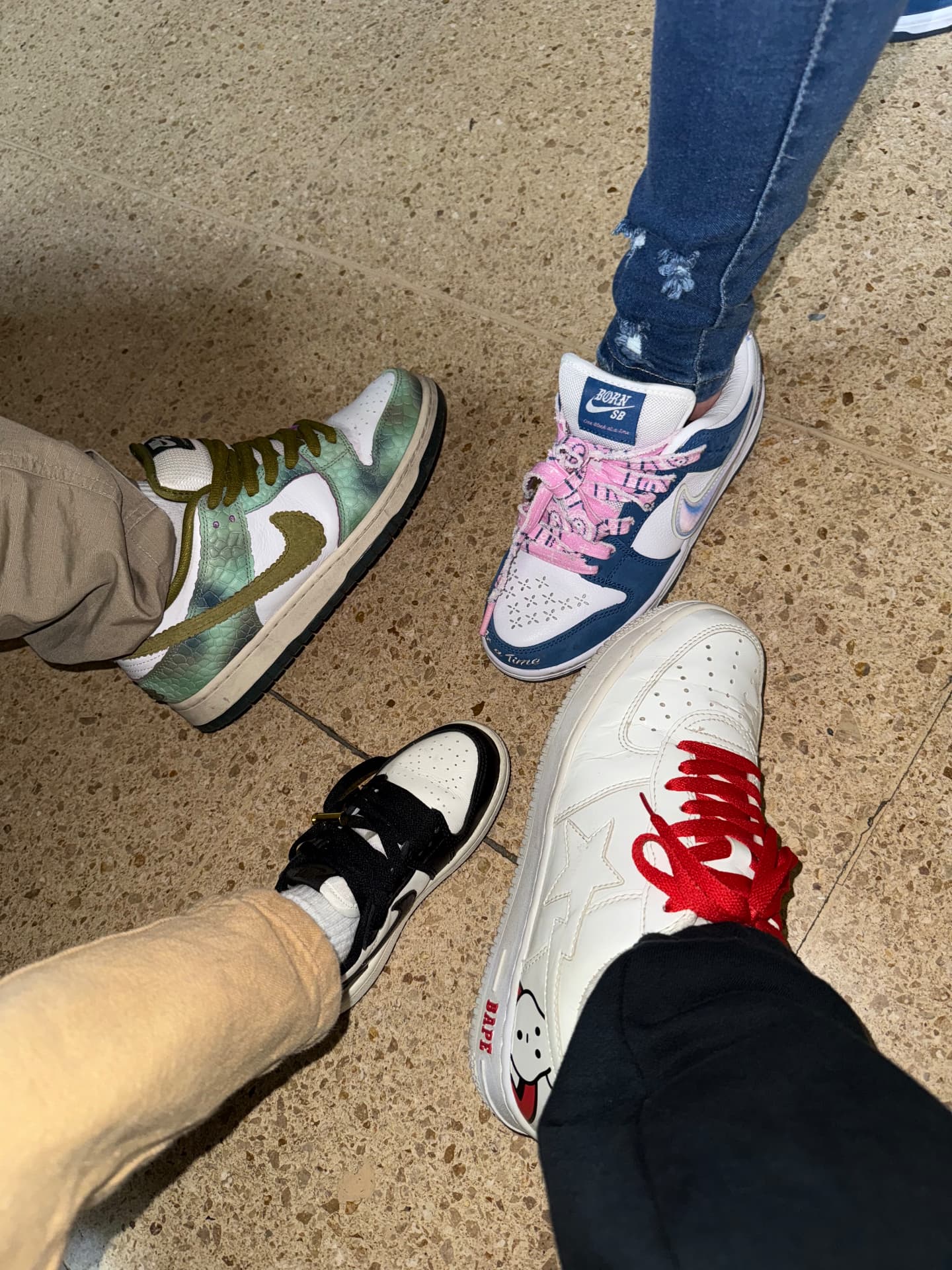 Sneaker pairs together on the floor